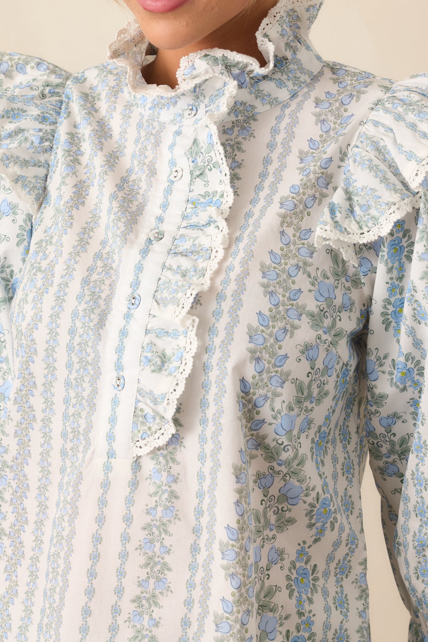 An extreme close-up of the fabric, showcasing the floral design and texture of the material.